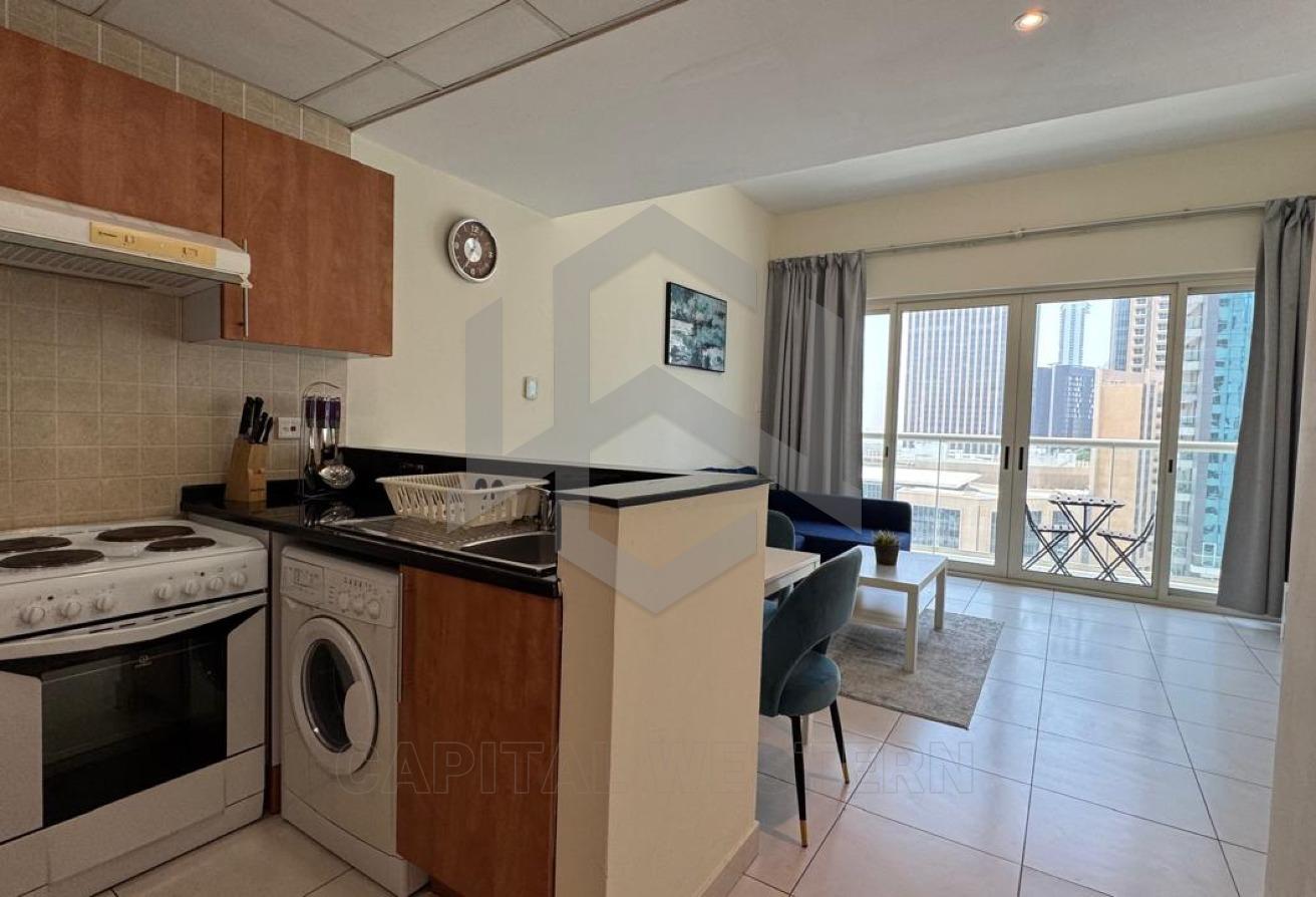 Spacious 1BR | SZR View | 5mins from Metro — 3