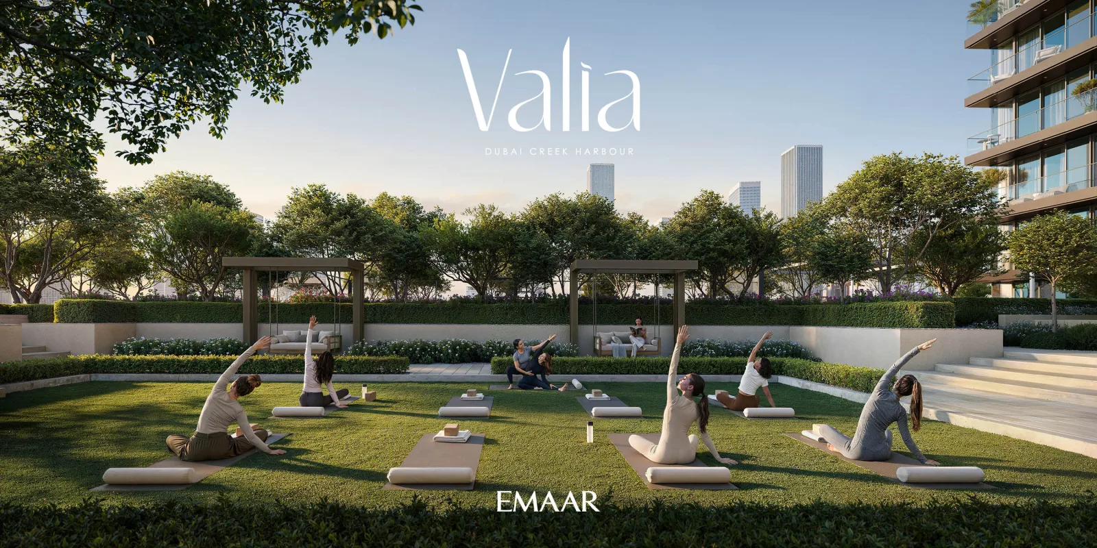 Valia by Emaar — pool deck at sunset